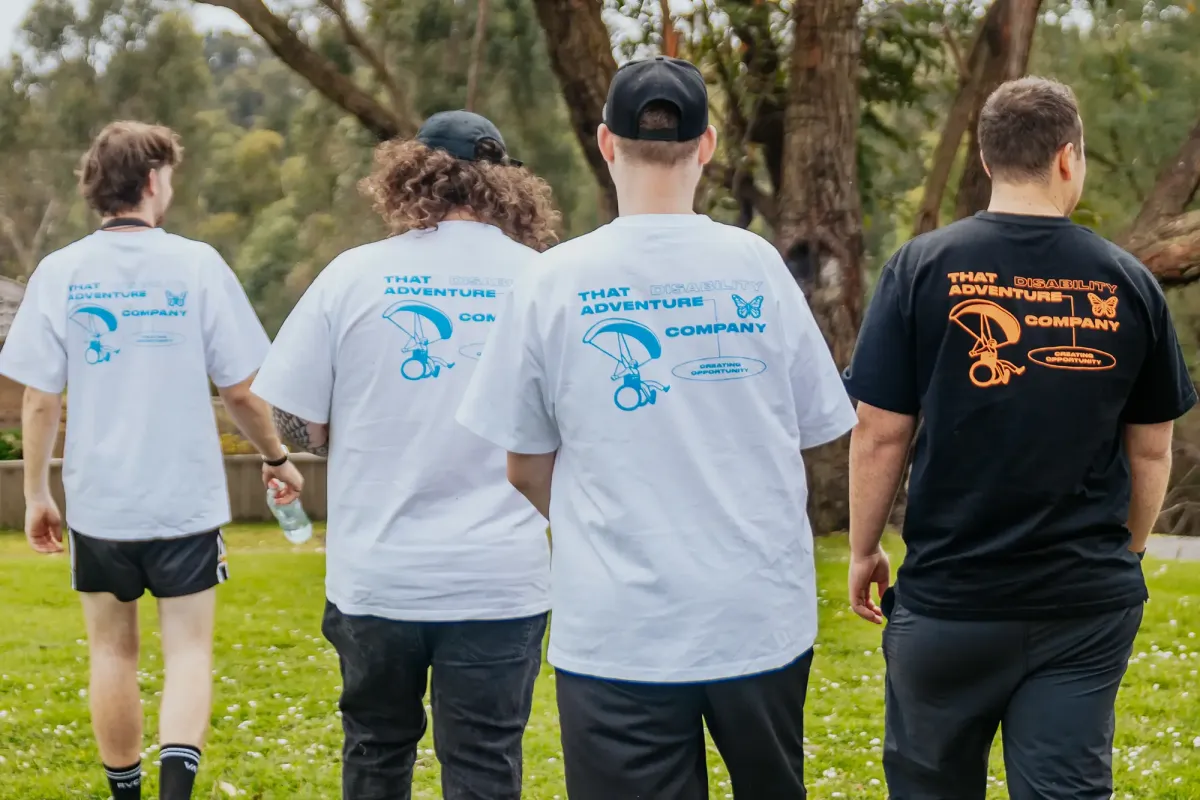 Group of teens with disabilities enjoying a forest walk