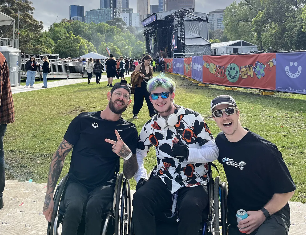 Support worker with young participant smiling outdoors